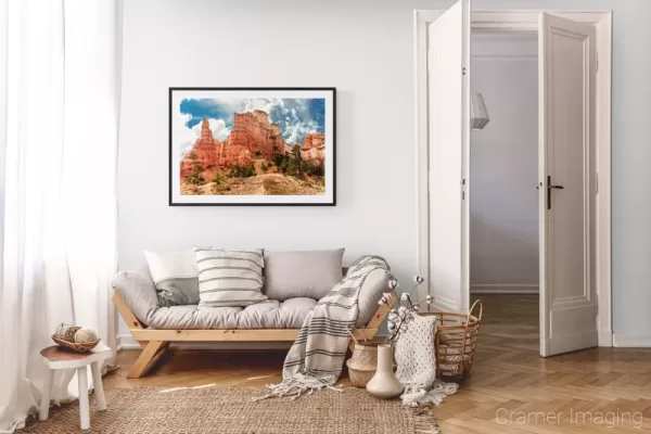 Photograph of Cramer Imaging's landscape photo "Ancient Red Skyscrapers" in a cozy neutral-toned living room