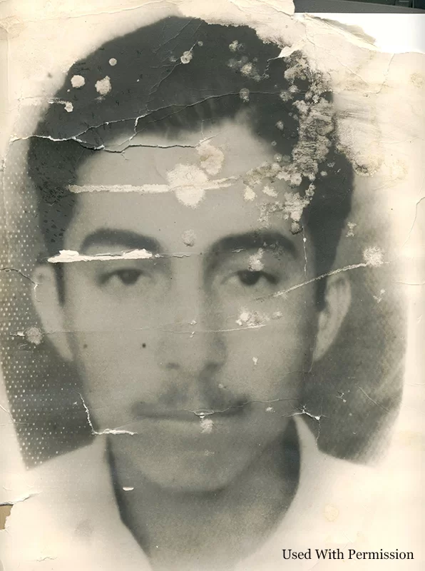 Old, aged, and acid-damaged headshot of a man