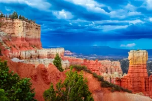 Fine art landscape photograph of Agua Canyon of Bryce Canyon National Park Utah with dark strormy clouds by Cramer Imaging