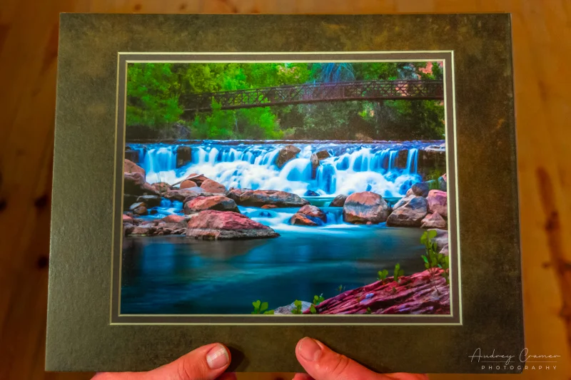 Audrey Cramer Photography's photograph of a man holding a matted copy of "Untouched" as a memory