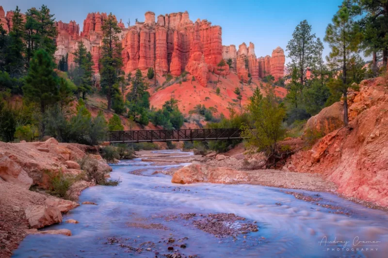 Audrey Cramer Photography's fine art landscape photograph of the bridge over the Tropic ditch with hoodoos in Bryce Canyon National Park Utah