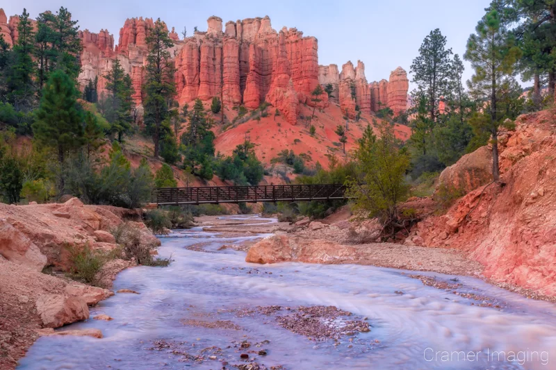 Cramer Imaging's fine art landscape photograph of the bridge over the Tropic ditch with hoodoos in Bryce Canyon National Park Utah