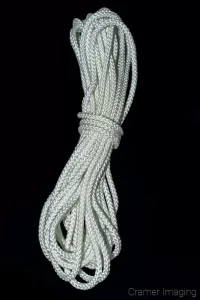 Cramer Imaging's photograph of a coil of white rope against a black background