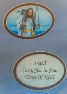 Cramer Imaging's photograph of a religious picture and a saying in a double circular double layer blue mat