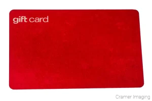 Cramer Imaging's professional quality photograph of a red gift card on a white background