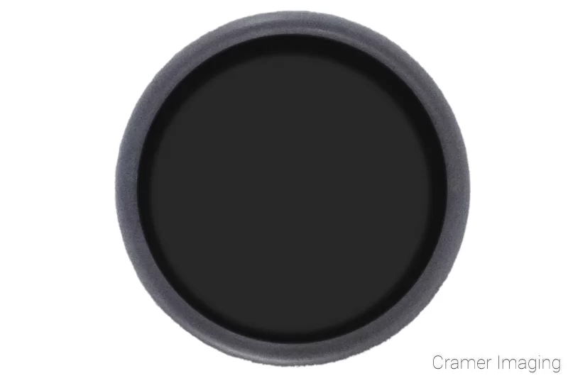 Illustration of a dark camera filter Neutral density or ND filter on white background by Audrey Cramer Photography