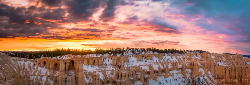 Cramer Imaging's fine art landscape panorama photograph of a dramatic sunset over Bryce Canyon National Park Utah