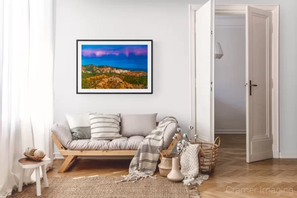 Photograph of Cramer Imaging's landscape photo "A Bit of Rainbow" in a cozy neutral-toned living room