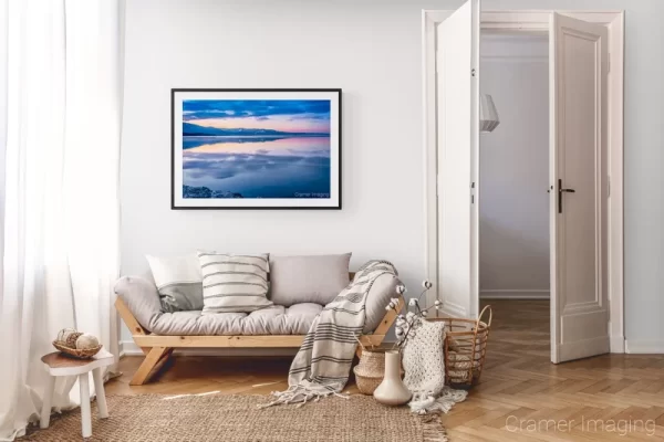 Photograph of Cramer Imaging's landscape photo "The Day Dawn is Breaking" in a cozy neutral-toned living room