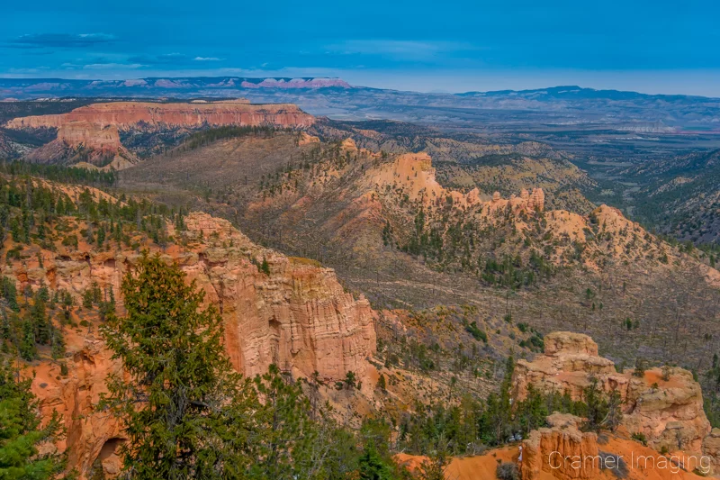 Fine art landscape photograph of Bryce Canyon's Piracy Point under cloudy skies by Audrey Cramer Photography