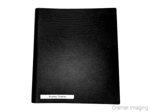 Cramer Imaging's photograph of a binder style black portfolio for photographer Audrey Cramer