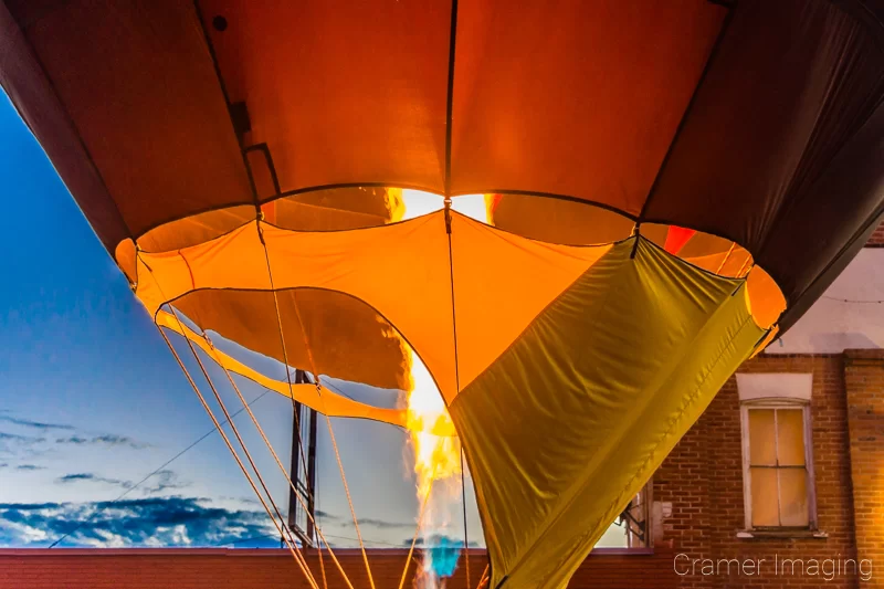 Closeup fine art photograph of a propane jet of flame blowing up a hot air balloon in Panguitch, Utah by Audrey Cramer Photography