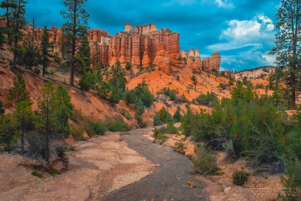 Cramer Imaging's fine art landscape photograph of moody monsoon skies over the Bryce Canyon Utah desert and Tropic irrigation water canal