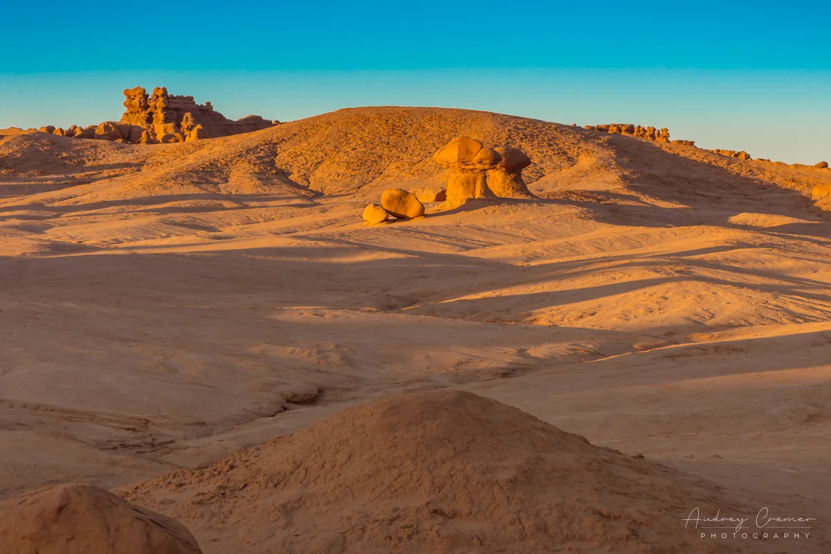 Audrey Cramer Photography's fine art landscape photograph of dusty desert sands at Goblin Valley State Park Utah