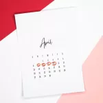 Calendar of the month of April with 4 dates circled on a colored background