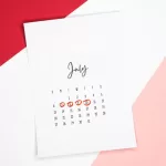 Calendar of the month of July with 4 dates circled on a colored background