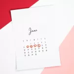 Calendar of the month of June with 4 dates circled on a colored background