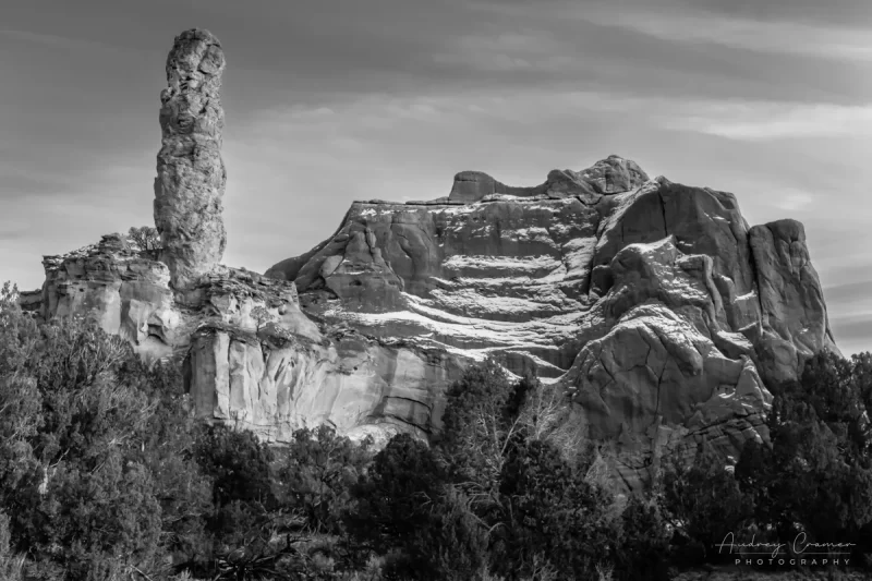 Audrey Cramer Photography's fine art monochrome landscape photograph of winter snow dusting a rock formation in Kodachrome State Park Utah