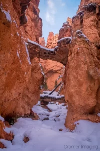 Cramer Imaging's fine art landscape photograph of two Bridges in winter with snow at Bryce Canyon National Park Utah