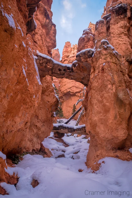 Audrey Cramer Photography's fine art landscape photograph of two Bridges in winter with snow at Bryce Canyon National Park Utah