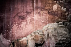 Cramer Imaging's photograph of ancient Native American pictographs carved on the rock walls of Capitol Reef National Park, Utah