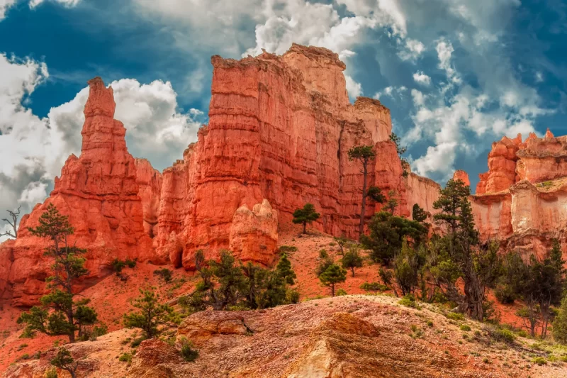 Audrey Cramer Photography's professional quality landscape photograph of red rock formations and dramatic sky in Bryce Canyon National Park, Utah