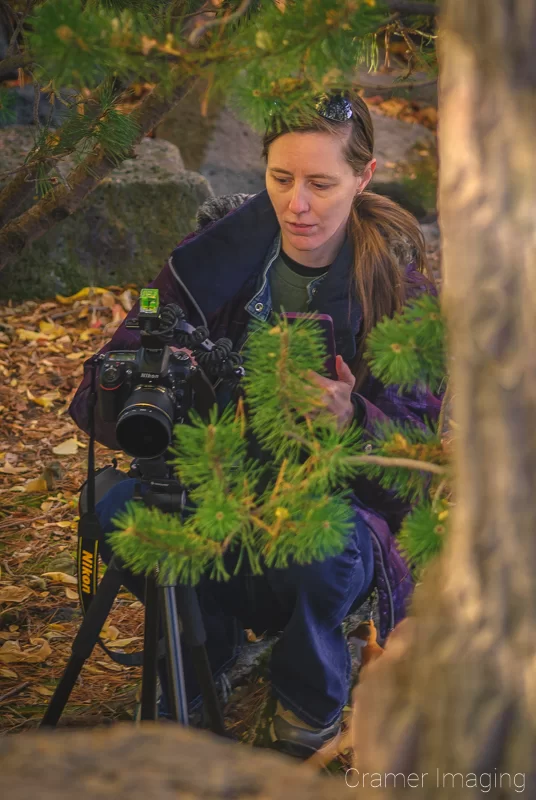 Photo of professional landscape photographer Audrey taking a wide-angle long exposure picture by Audrey Crame Photography