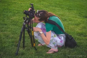 Photograph of professional landscape photographer Audrey Cramer taking a picture from below