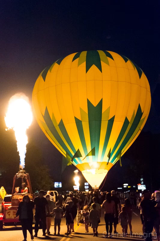 Audrey Cramer Photography's fine art photograph of a hot air balloon glow and a candle-lighting at night in Panguitch Utah