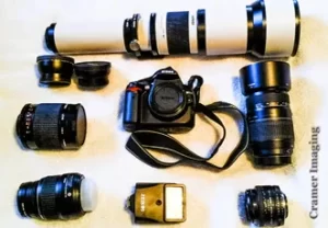 Professional quality photograph of a beginner's camera kit with a few specialty lenses