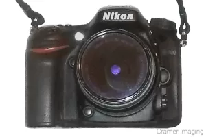 Cramer Imaging's photograph of a DSLR camera with a wide-angle lens attached