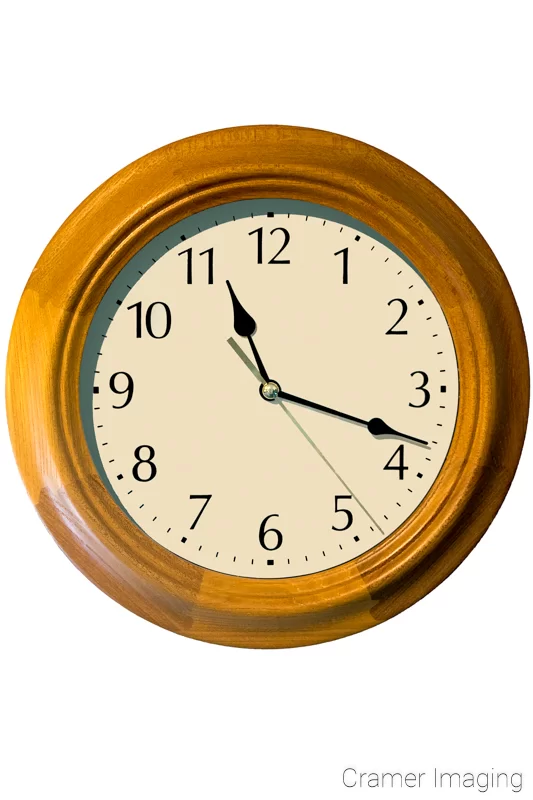 Audrey Cramer Photography's professional quality stock photograph of a wooden wall clock on a white background