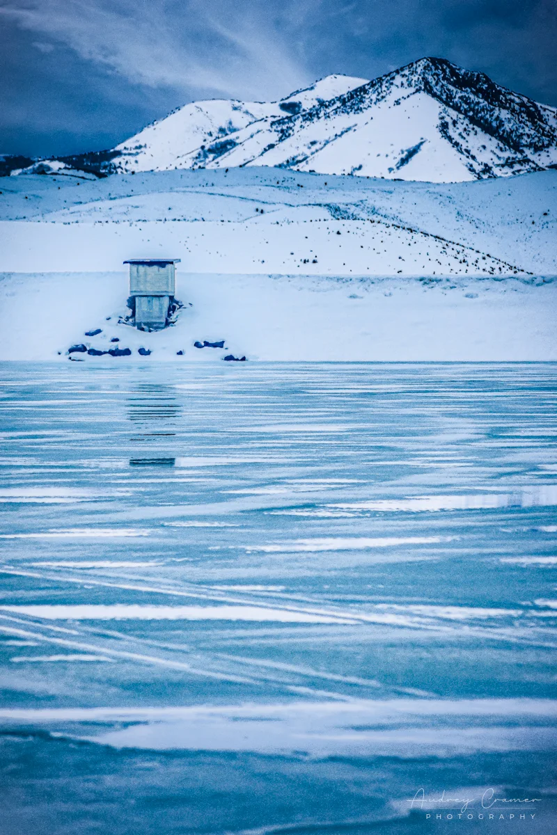 Cramer Imaging's professional quality landscape photograph of scenic Devil's Creek Reservoir or lake frozen with ice and snow