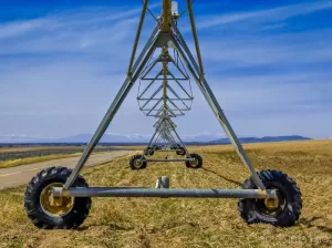 Professional landscape photograph of farm equipment pivot line in Ririe, Idaho by Cramer Imaging