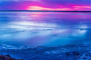 Cramer Imaging's fine art landscape photograph of the American Falls, Idaho reservoir in the winter at sunset