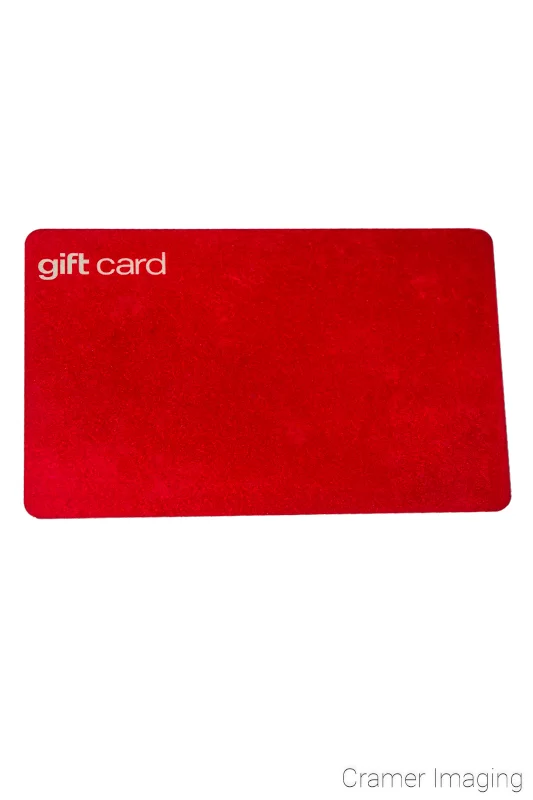 Audrey Cramer Photography's professional quality photograph of a red gift card on a white background