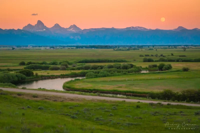 Audrey Cramer Photography's professional quality landscape photograph of the Teton mountains and river at moon rising in Tetonia, Teton, Idaho