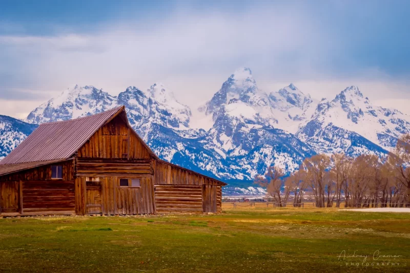 Audrey Cramer Photography's fine art landscape photograph of the Moulton Barn against the mountains of Grand Teton National Park Wyoming