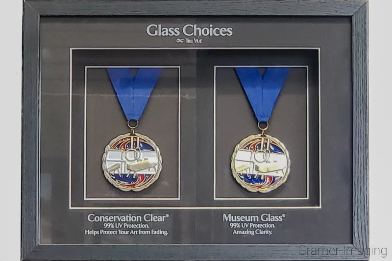 Audrey Cramer Photography's photograph of regular vs. museum quality picture glass display