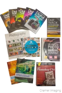 Cramer Imaging's photograph of several different photography and photography-related education books