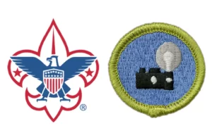 Graphic of the Boy Scouts of America Logo with the Photography Merit Badge on a white background