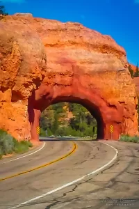 Photograph of one of the arch tunnels on the road in Red Canyon Utah