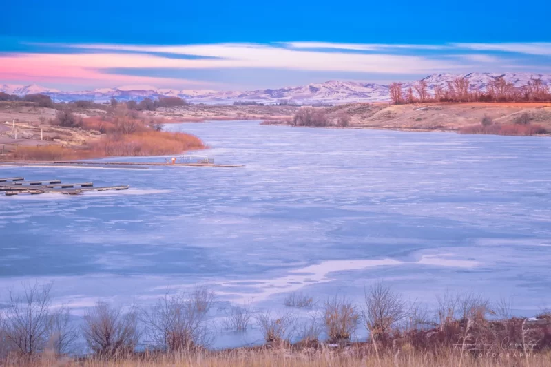 Audrey Cramer Photography's fine art landscape photograph of iced over Seagull Bay on the American Falls Reservoir, Idaho in winter