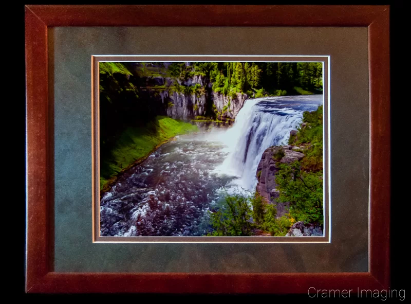 Audrey Cramer Photography's photograph of an award-winning photos depicting a waterfall in a simple double mat and wooden frame