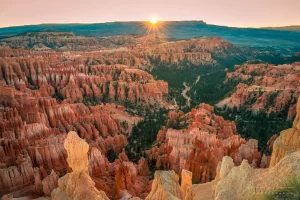 Cramer Imaging's fine art landscape photograph of the sun rising over Inspiration Point in Bryce Canyon National Park Utah