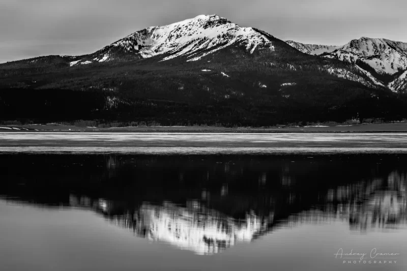 Audrey Cramer Photography's black and white or monochrome fine art landscape photograph of a mountain reflecting in a calm lake