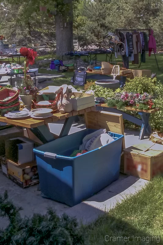 Audrey Cramer Photography's photograph of a springtime yard sale with items for sale on display