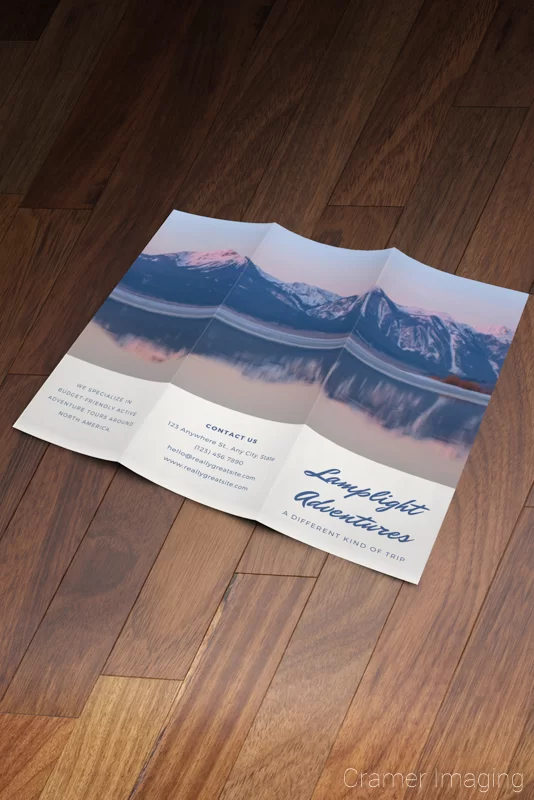 Mockup of a brochure featuring the Cramer Imaging landscape photograph "Henry's Lake"