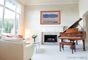 Photograph of Cramer Imaging's "Henry's Lake" in a living room setting with a piano