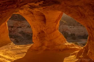 Cramer Imaging's fine art landscape photograph of two entrances to the Moqui sand caverns in Southern Utah